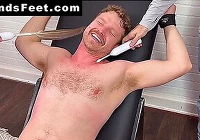 Russ Laughs Hard While His Doms Dan And Girth Tickle His Big Feet
