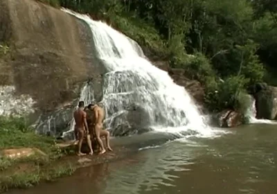Three Nude in the River