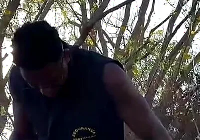 Vigilante Humiliating the Worker