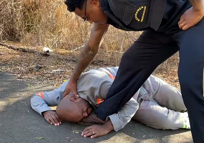 Vigilante Humiliating the Worker