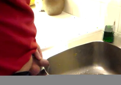 John Is Pissing in the Kitchen Sink