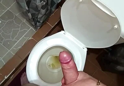 Two Shots of Cum on the Pee in the Bathroom