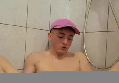 Young Twink Plays with His Piss and Jerks off