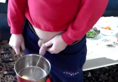 John Is Pissing Into a Kitchenpot