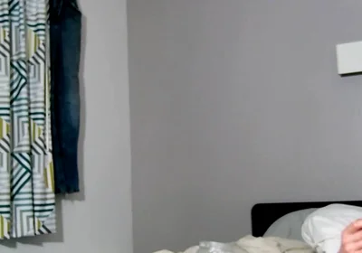 On Bed Laying Down with Socks and Beater on