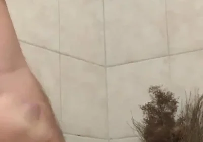 In the bathroom with a beach ball