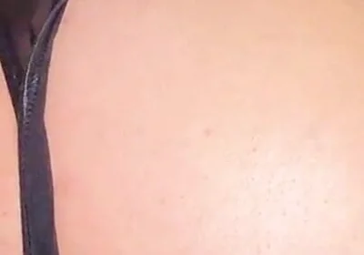 A Gay Man Dressed as a Woman Moves in a Seductive Manner.