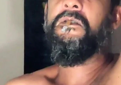 Smoking in Red Underwear