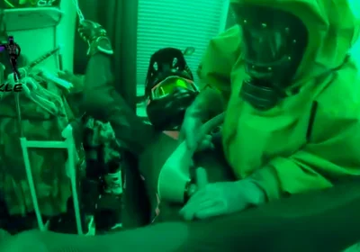 Hazmat gear boys fucking biker in sling