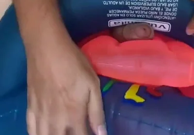 Playing with inflatable swim ring