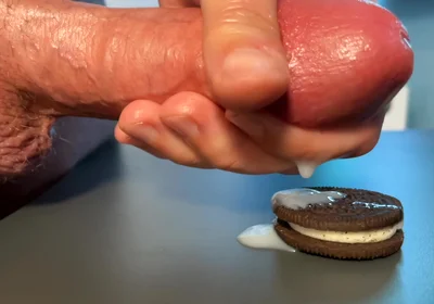 Slow-mo Oreo Cumshot: Dripping Sperm Load on Cookie Close-up!