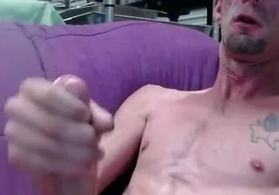 Masturbating