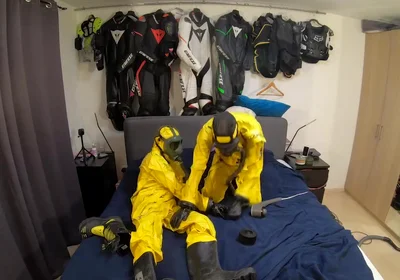 Vacuuming in tellchen hazmat suits