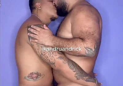 Two Big Boys Kissing