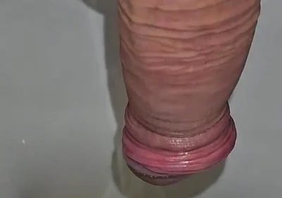 Male Peeing Into the Toilet