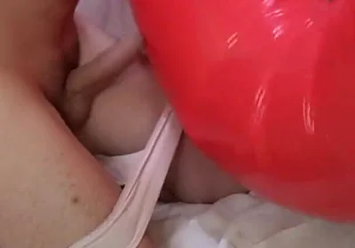 Playing with Red Swimring Pool Toy