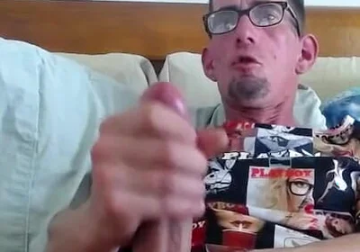 Masturbating