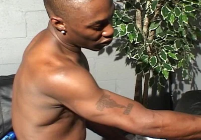 Tattooed Black Man Spanks and Bangs a Dude with Tight Asshole in Bareback Style