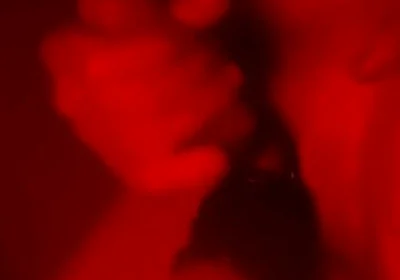 Oily Masturbation in Red Monochrome