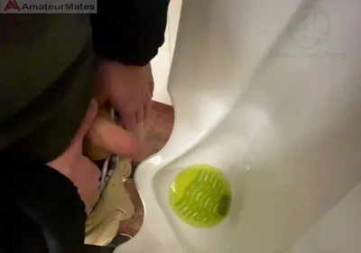 Amateur Redhead Guy Caught Pissing in a Public Toilet's Urinal - He Then Quickly Plays with His Cock Before Leaving