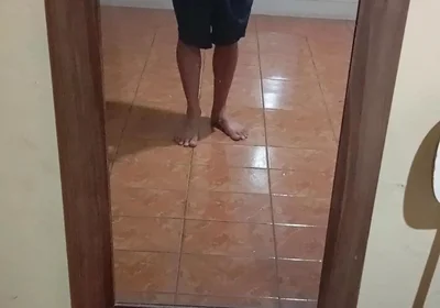 Boy in Shorts in the Mirror
