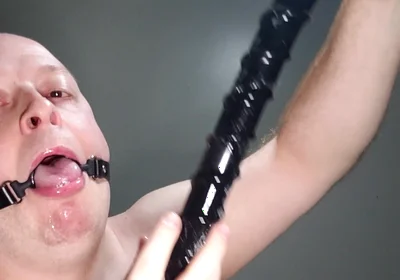 Deepthroating an 18 Inch Dildo with Mouth Gag Ring