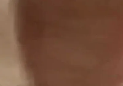 Masturbating