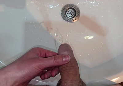 Pissing to the Bathroom Sink