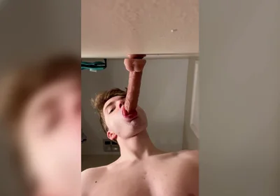 Cock Hungry Twink Slobbers on Giant Dildo!