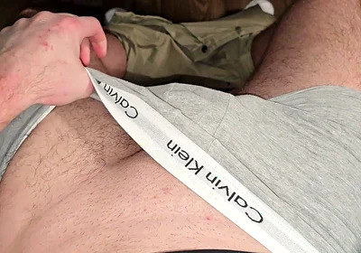 German masked guy rubs huge bulge.. grey Calvins down.. cock dripping heavy