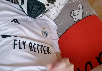 The Guy Is Wearing a Soccer Uniform and Mxhelmet with a Morning Cum