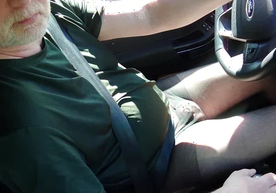 Nylonjunge Driving Car in Black Pantyhose