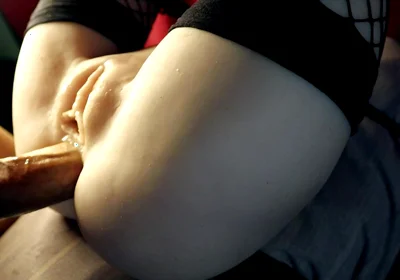 A Beauty in Stockings Spreads Her Charms in Front of a Big Cock