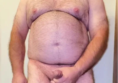 Anal Steve in His Blue Thong Showing off His Bear Body and Cock, with a Cock Ring on and Showing His Massive Butt Plug