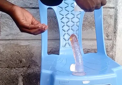 Big Black Ass Bottom Riding His Dildo Outside