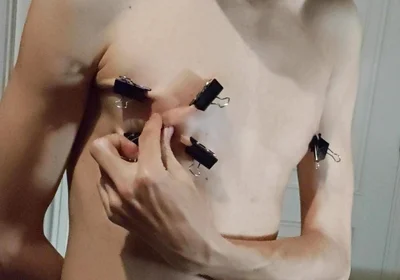 Twink Playing with Binder Clips