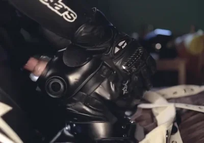 Rubber boy sucking biker master cock