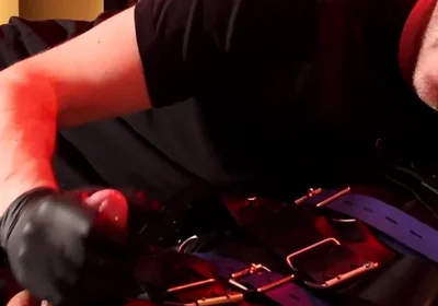 Edging the Boy in Leather Bondage but He Is Not Allowed to Orgasm
