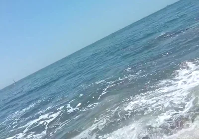 On the Beach on a Sunday