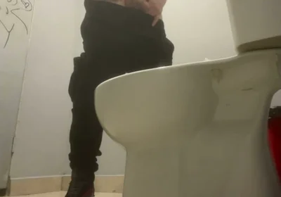 Amateur Friends Pissing Together in the Club's Toilets
