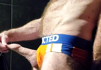 Muscle Bear Showing off His Uncut Cock