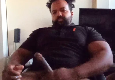 Thick Mixed Latino Bear Jacks off to Porn