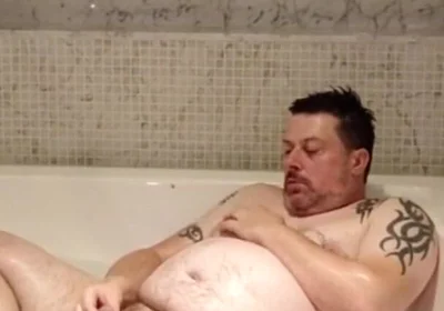 In the Big Bath Having a Wank