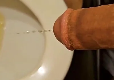 Shaved Cock Pissing