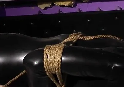 Roped in Latex: Zeus Struggles to Break Free