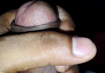 Masturbating