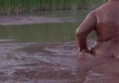 Mud Bath in Deep Quarry Mud Pond