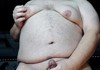Chubby Guy Stands and Cums