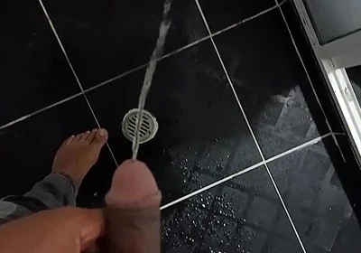 Urinating in Dark Jeans