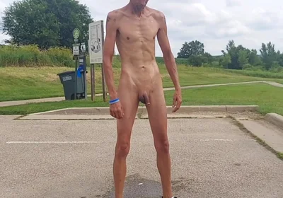 Naked and Pissing in Parking Lot
